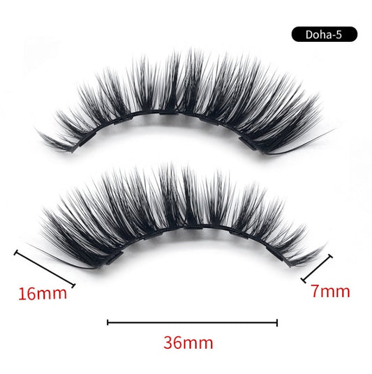 Pair of false eyelashes with measurements on a white background