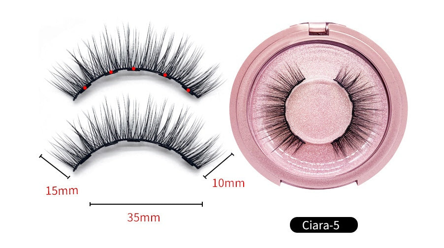 False eyelashes with a pink case and measurements on a white background