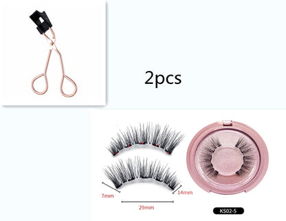 Set of false eyelashes with a case and applicator on a white background