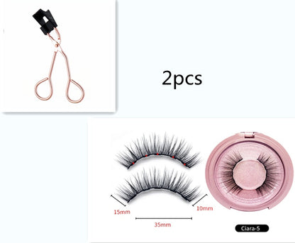 False eyelashes with a pink case and measuring details on a white background