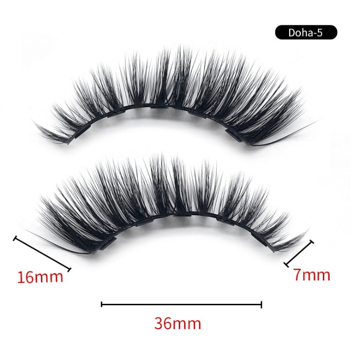 Pair of false eyelashes with measurements on a white background
