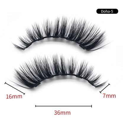 Pair of false eyelashes with measurements on a white background